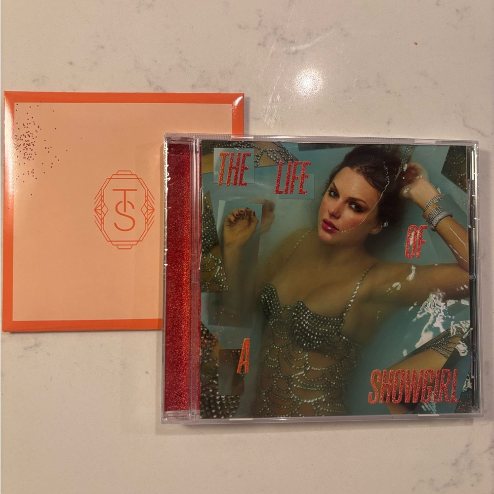 The Life of a Showgirl Taylor Swift CD with surprise pics